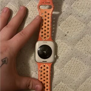 Vibrant Orange Smartwatch with Square Display and Sporty Design